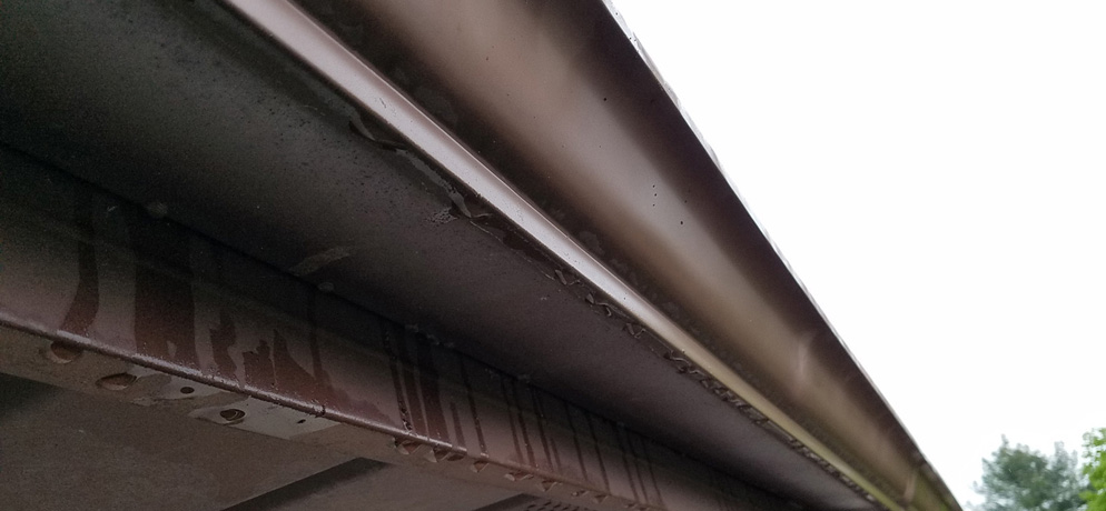 rain running behind the gutter